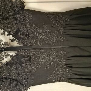 Black Sleeveless Gown with Intricate Lace for Prom